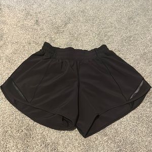 black lululemon hotty hot shorts. size 4 and 4 inches.